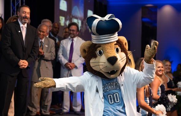 odu mascot in white lab coat